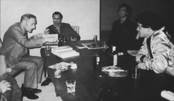 Lou Reed smirks as he makes Burroughs sign his last copy of a rare hardback - photo 10