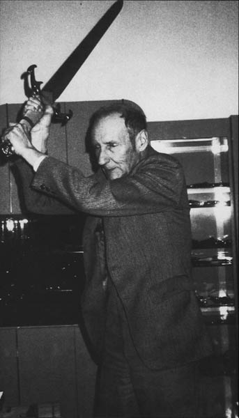 The immortal William Burroughs limbering up on a massive medieval sword from - photo 15