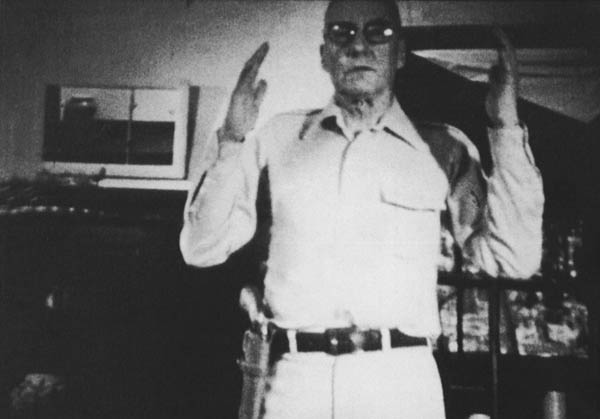 William Burroughs demonstrating how to draw and fire a handgun three stills - photo 21