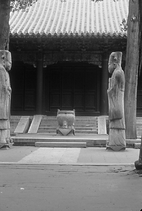 Plate 1 Guardian figures at the entrance to a temple in the Forest of - photo 3