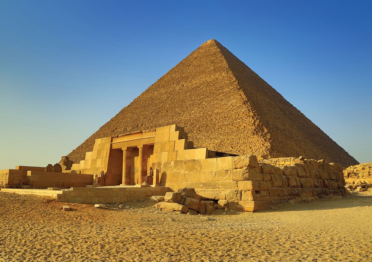 The entrance of the mastaba of Seshemnufer IV and the Great Pyramid in - photo 7