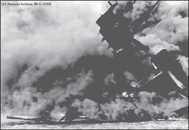 The USS Arizona burned and sank after being attacked by Japanese bombers It - photo 4