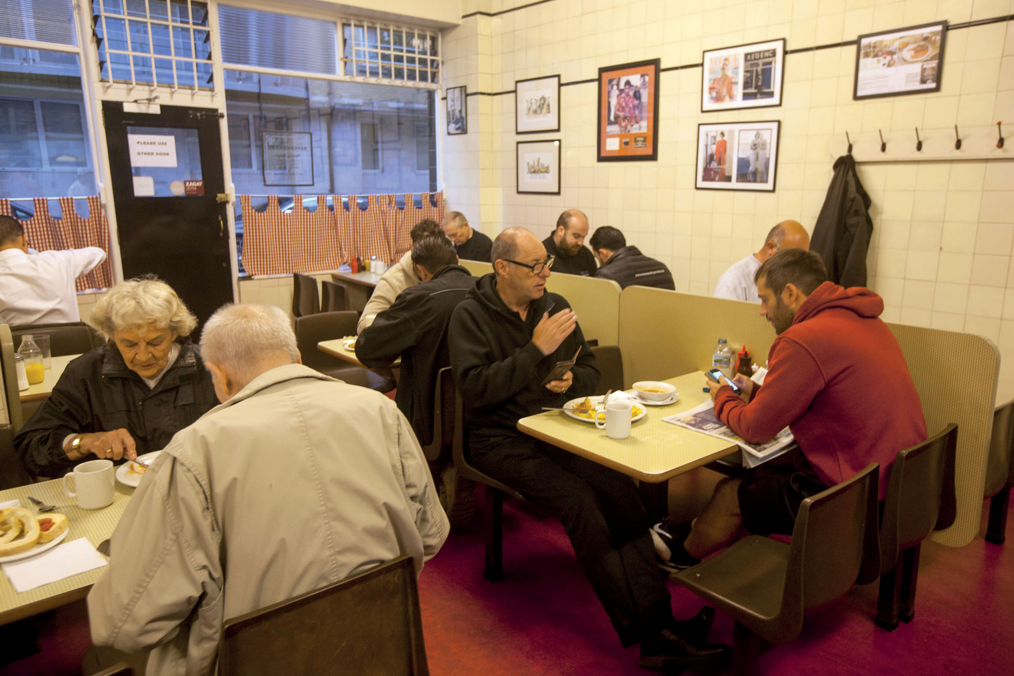 Londons working-class cafes do a lively trade in hearty breakfasts for - photo 4