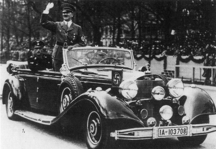 Hitler stands and waves to the crowd in Mnich March 16 1938 Photo from the - photo 4