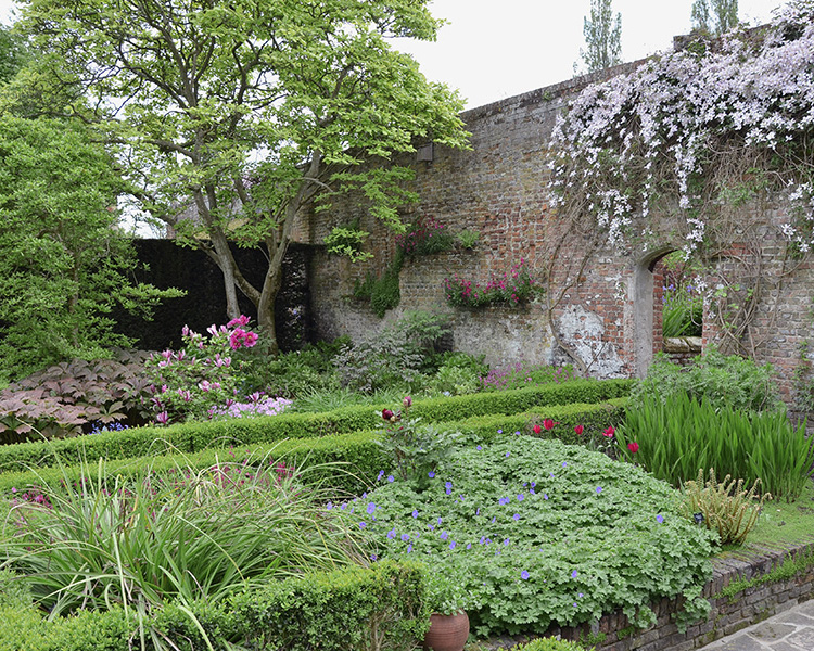 This beautiful space shaded by walls hedges and Magnolia trees at the - photo 6