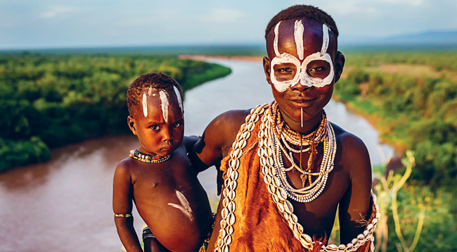 Karo woman and child BARTOSZ HADYNIAKGETTY IMAGES TOP EXPERIENCES - photo 5