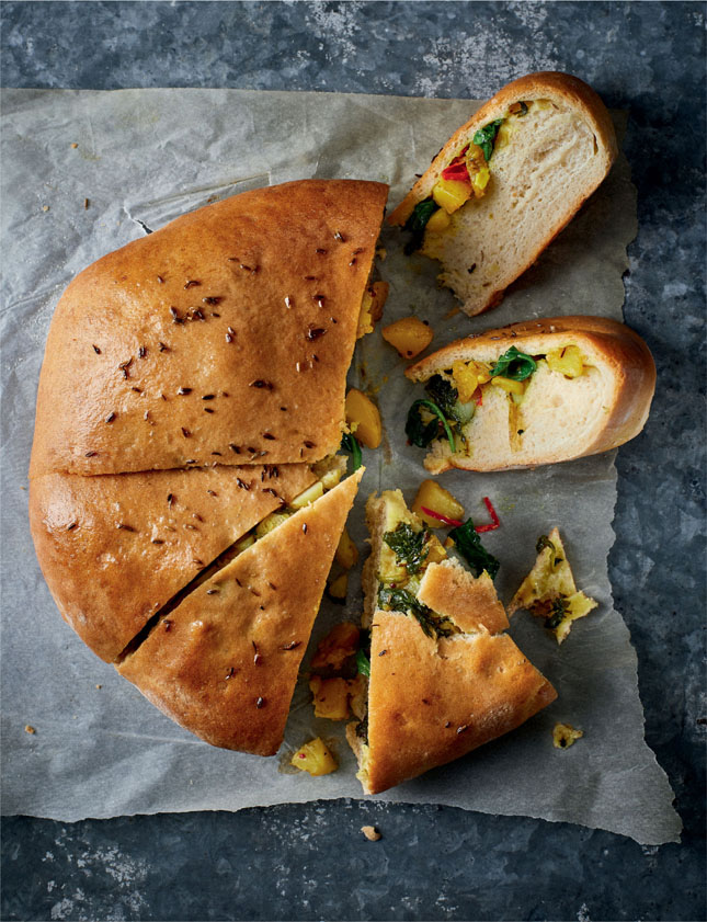 Stealing the show Using leftover sag aloo to stuff some bread was one of the - photo 8