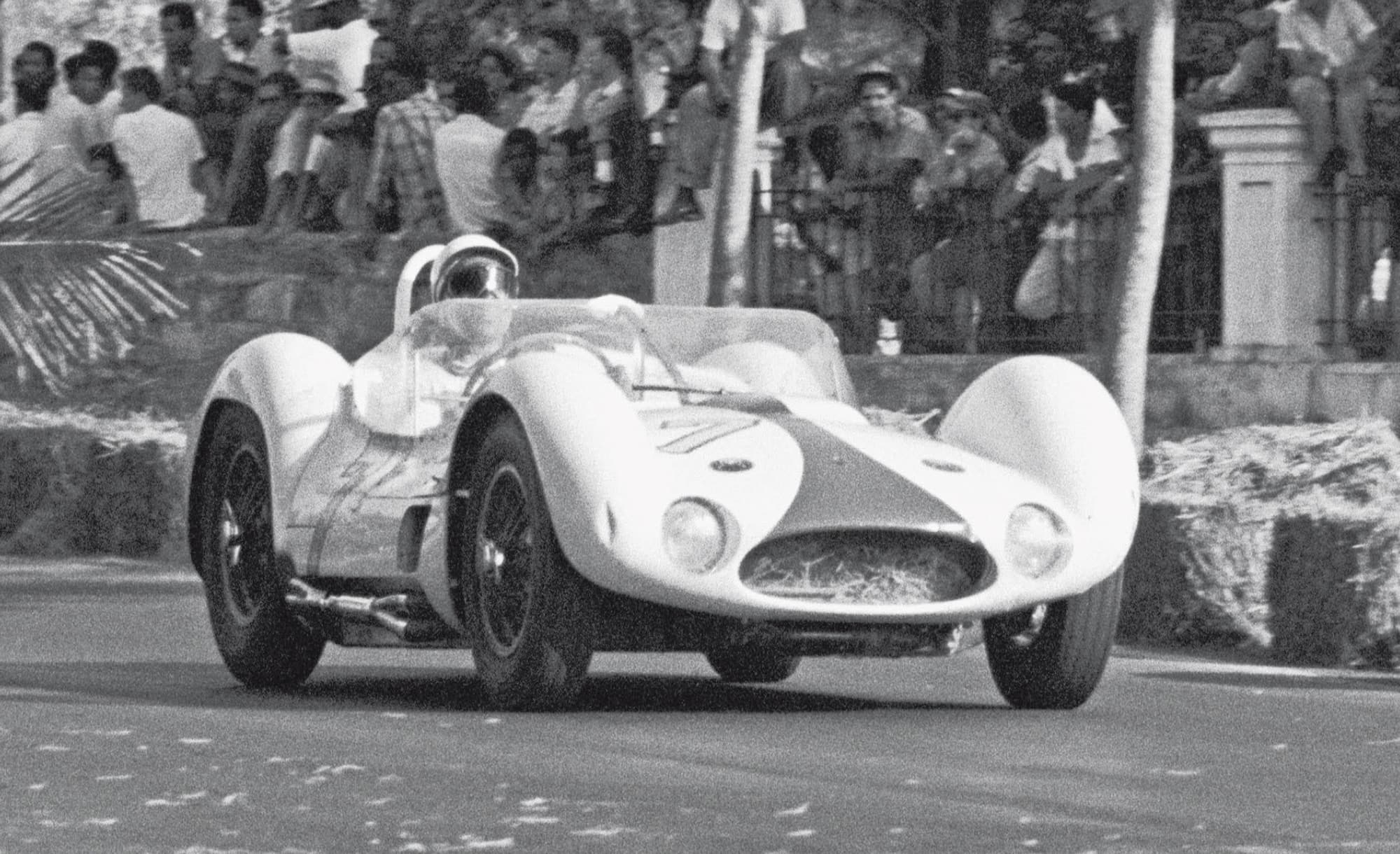 Race winner Stirling Moss on the airport circuit en route to winning Cubas last - photo 12