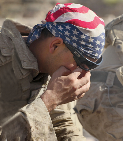 An American soldier wipes his eyes on Oct 19 2010 in Kajaki Afghanistan - photo 11