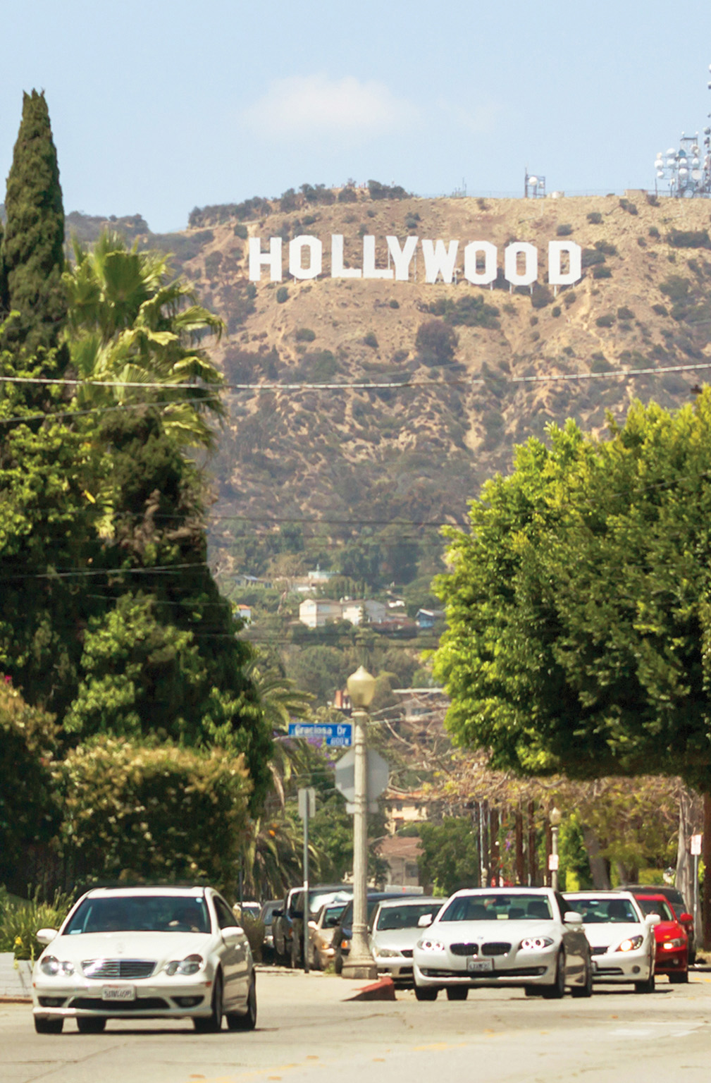 The Hollywood Sign makes for an iconic sight high on the hillside above the - photo 4