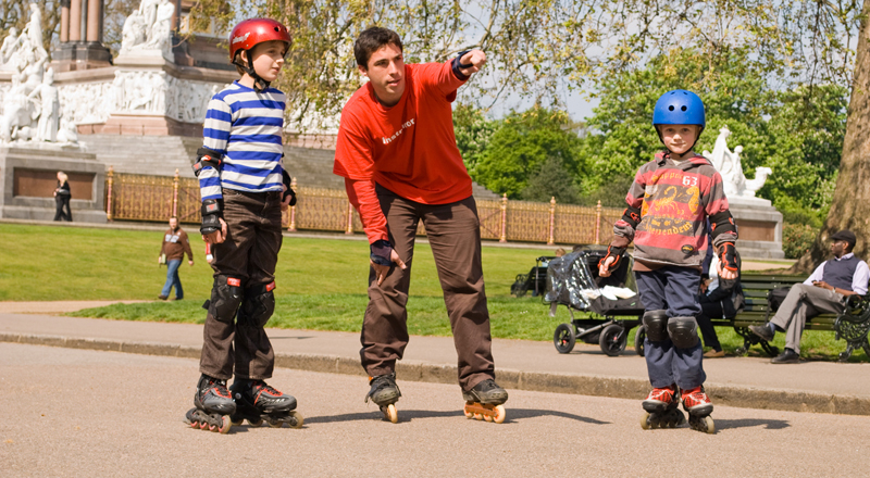 Enjoying a rollerblading lesson from a member of the Kids Rollerblading Lessons - photo 5