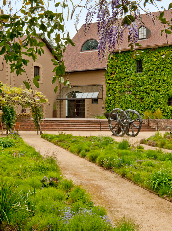 The ivy-covered three-story stone winery was erected in 1903 by wine merchant - photo 5