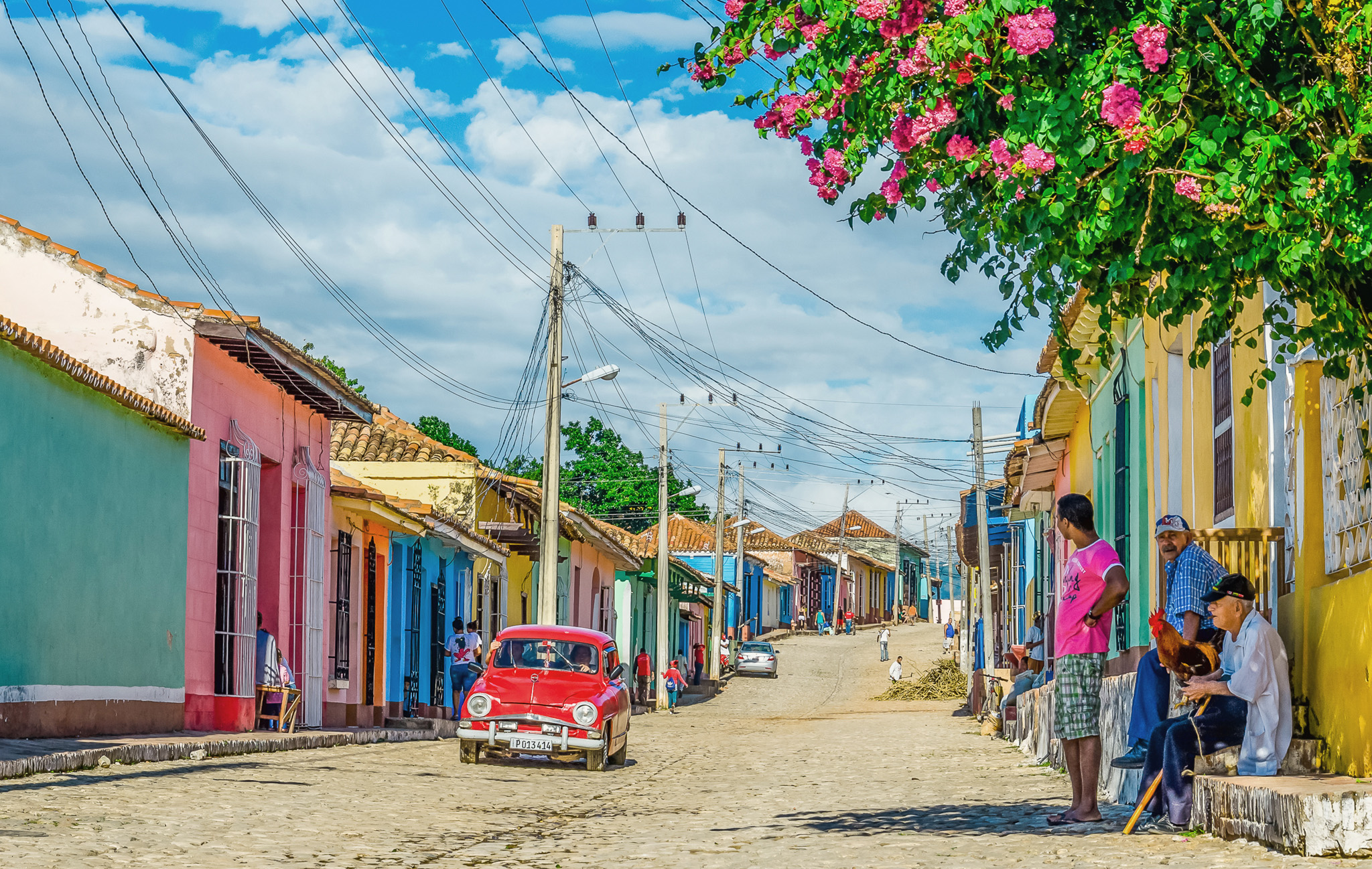 Trinidad is a pretty town where cobbled streets are lined with pastel-colored - photo 4