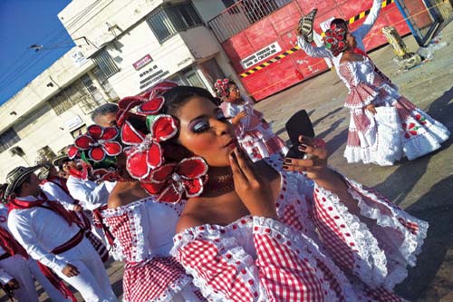 dancer preparing for Carnaval in Barranquilla beach near Palomino - photo 5