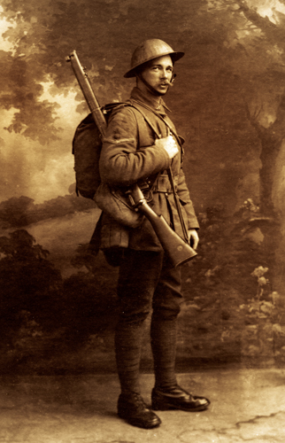 Tommy a British infantryman pictured in c1916 He carries full marching - photo 2