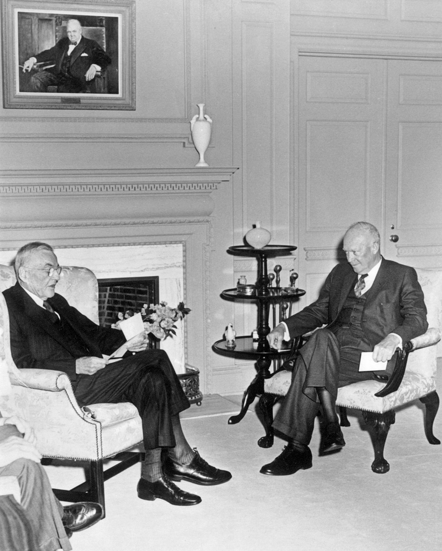 Secretary of State John Foster Dulles left and President Dwight D Eisenhower - photo 14