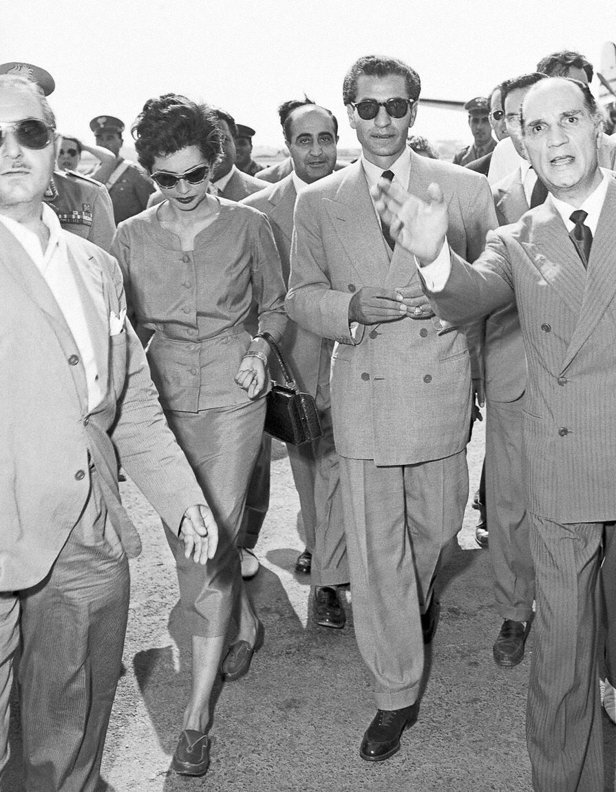 The shah of Iran Mohammed Reza Pahlavi and Queen Soraya arrive at the Rome - photo 16