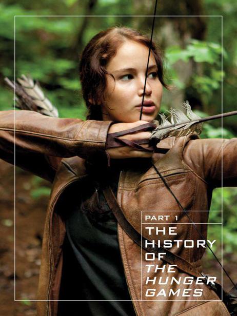 Katniss Everdeen Jennifer Lawrence stands in the crowd during the District 12 - photo 2