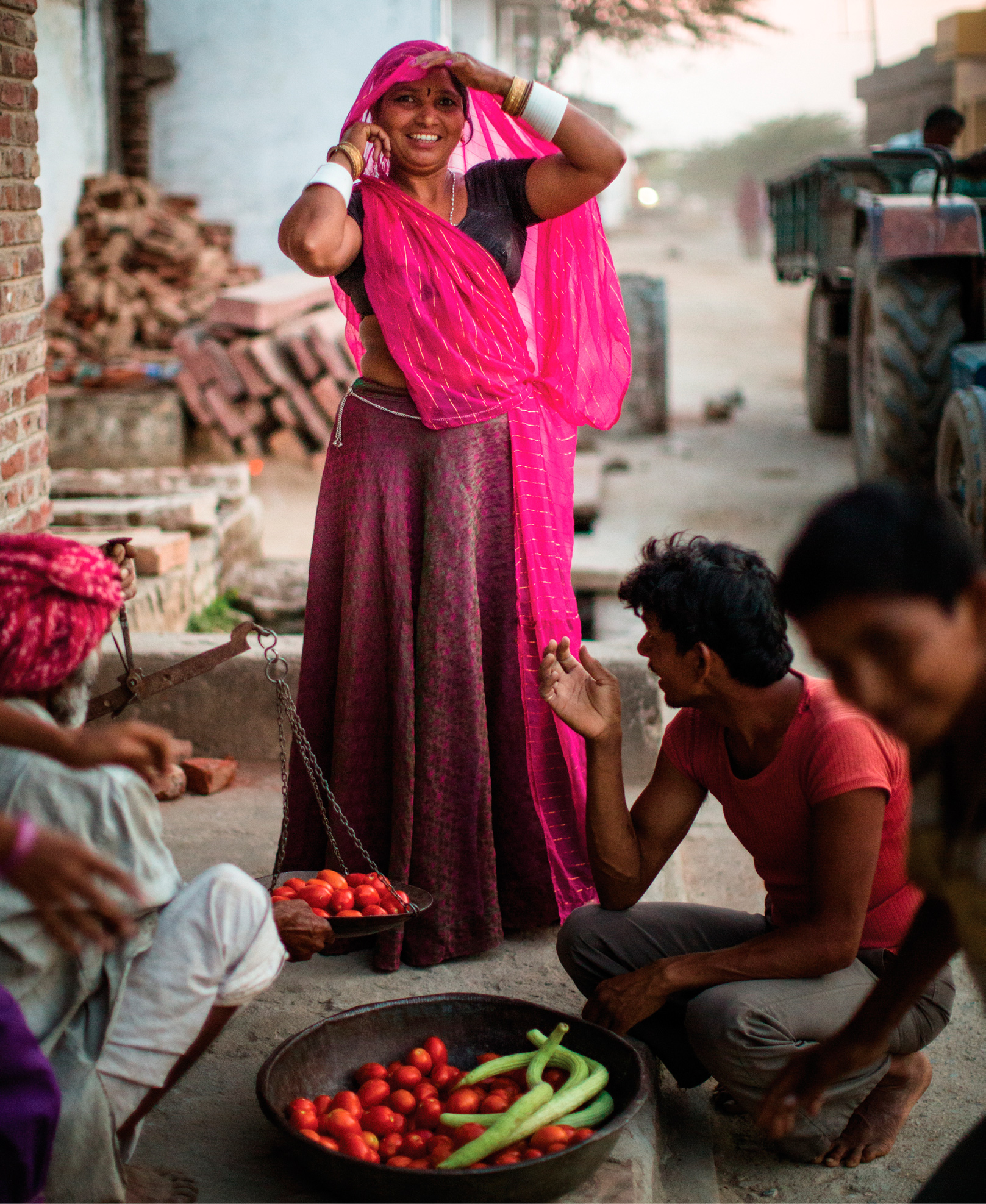 During harvest season Rabari women toil along with their husbands and sons in - photo 7