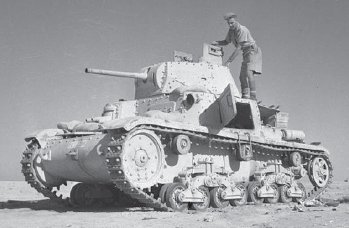 A soldier examines an Italian M1314 tank that had been knocked out at Alamein - photo 4