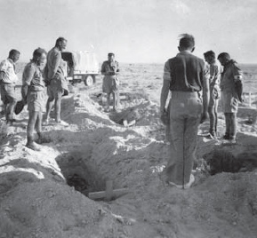 A New Zealand padre conducts a burial service for some of the fallen at El - photo 6