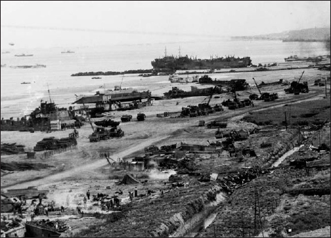 One of the D-Day beaches given over to the landing of stores after the assault - photo 9