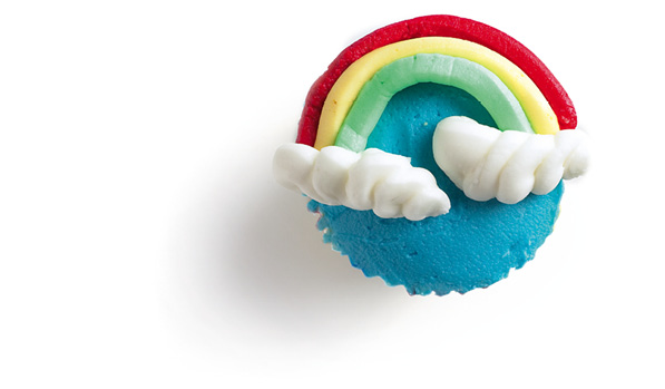 Colourful rainbow cup cakes like these will brighten any party table - photo 10