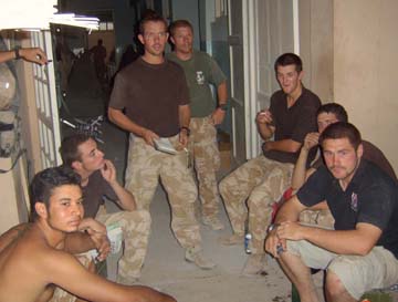 Lt Paul Martin briefs Barossa Platoon inside the clinic Left to right Rgr - photo 13