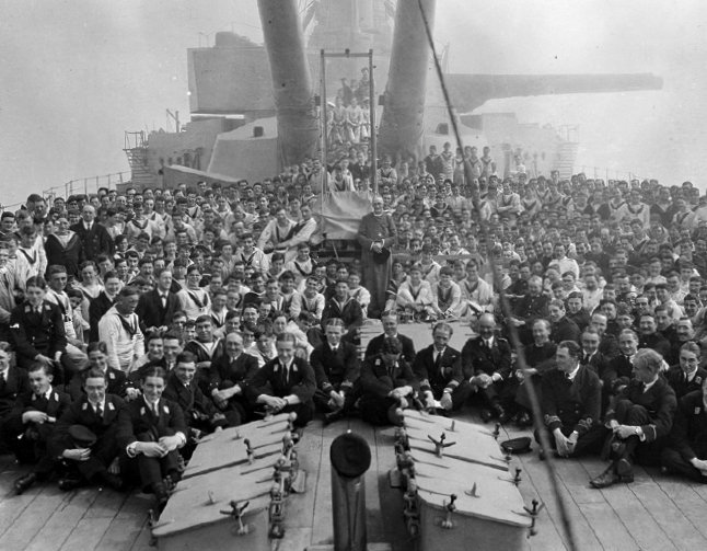 Crew of the battleship Queen Elizabeth assembled for a visit by the Bishop of - photo 5