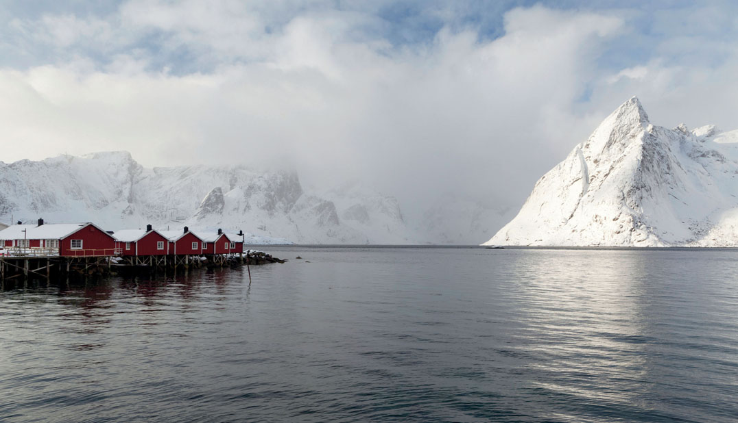 A break in the clouds in Moskenes Harbor Lofoten Islands Norway In - photo 11