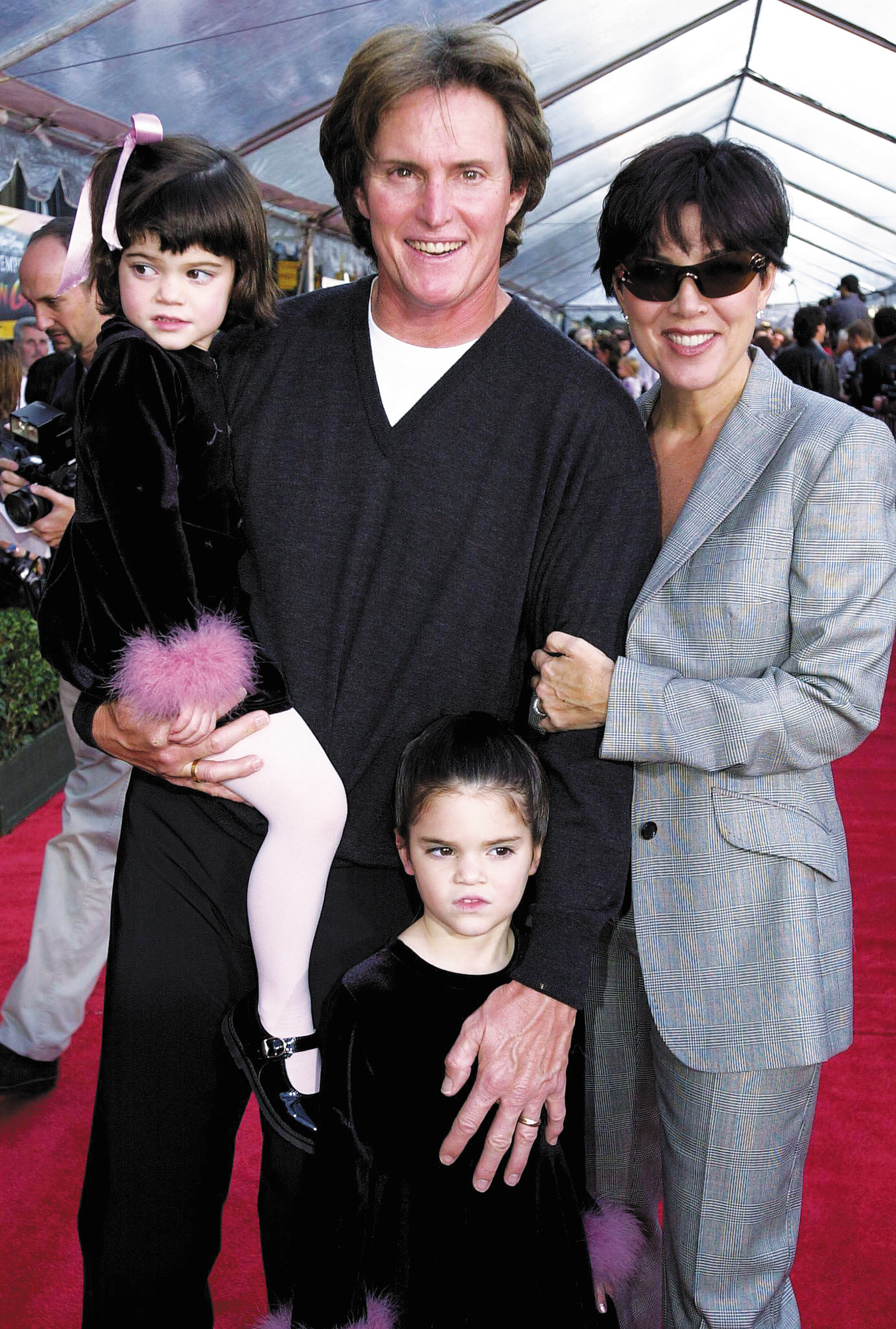 Kris and Bruce Jenner with their two young daughters Kylie left and Kendall - photo 3