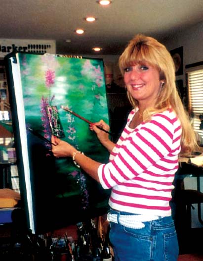 Lee Hammond painting in her studio in Overland Park Kansas There are many - photo 1