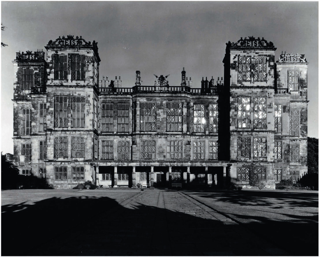 The New Hall the west front 1959 by Edwin Smith showing the house battered - photo 17