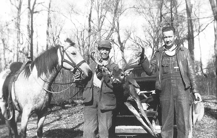 Al Carr and unidentified man with deer and P K Huffmans horse Annie - photo 7