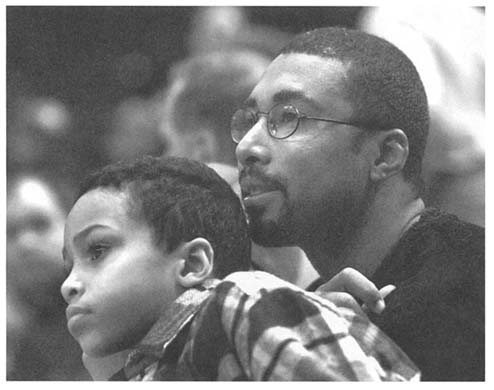 Bernie watches a St Johns-Duke basketball game with his son Bernie - photo 3