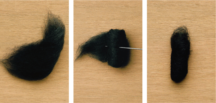 Take a strip of black wool and roll it into a tube Then jab through with the - photo 9