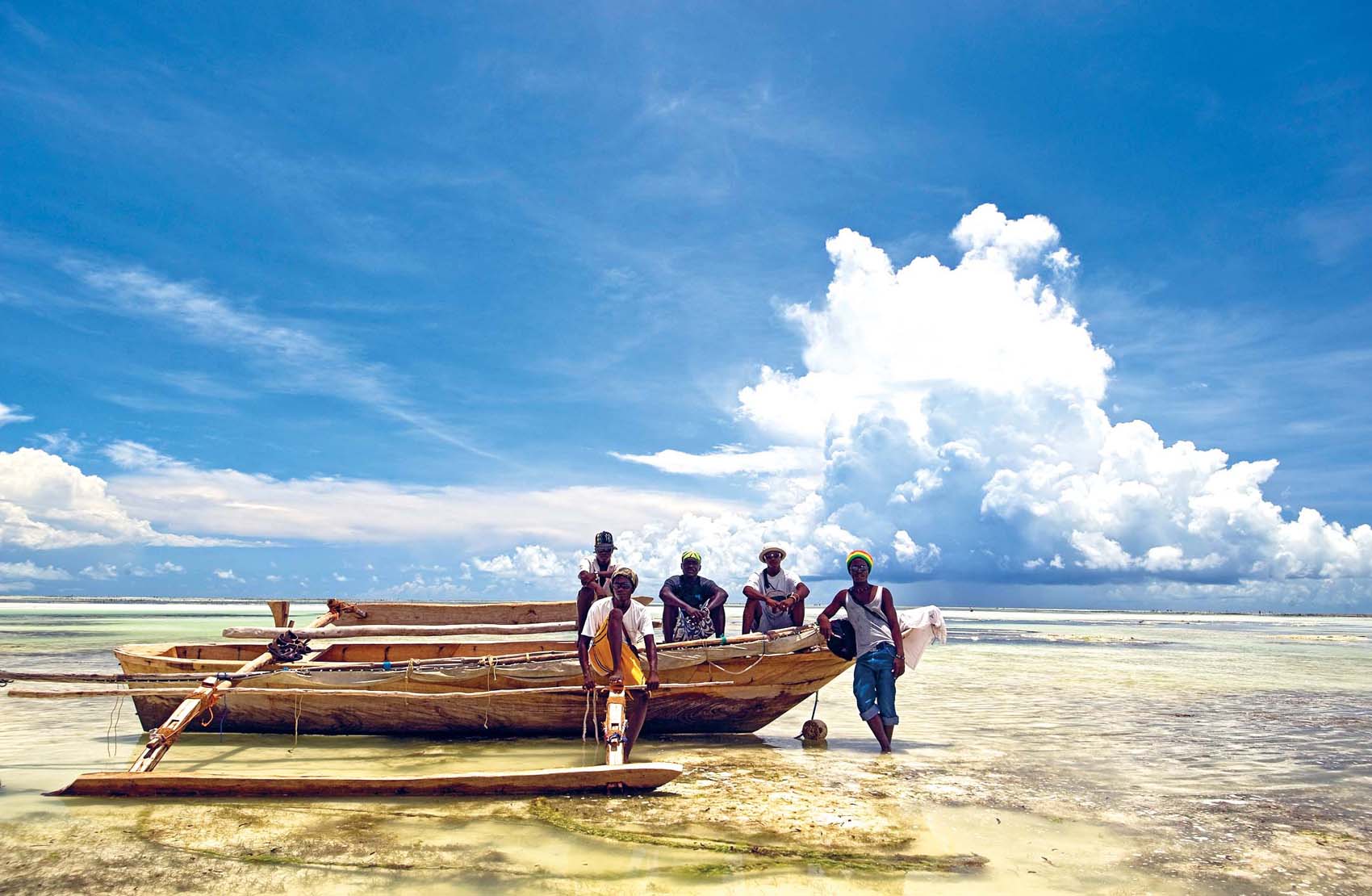 DOUGLAS STEAKLY LONELY PLANET IMAGES Boys and boat on a beach Zanzibar - photo 3