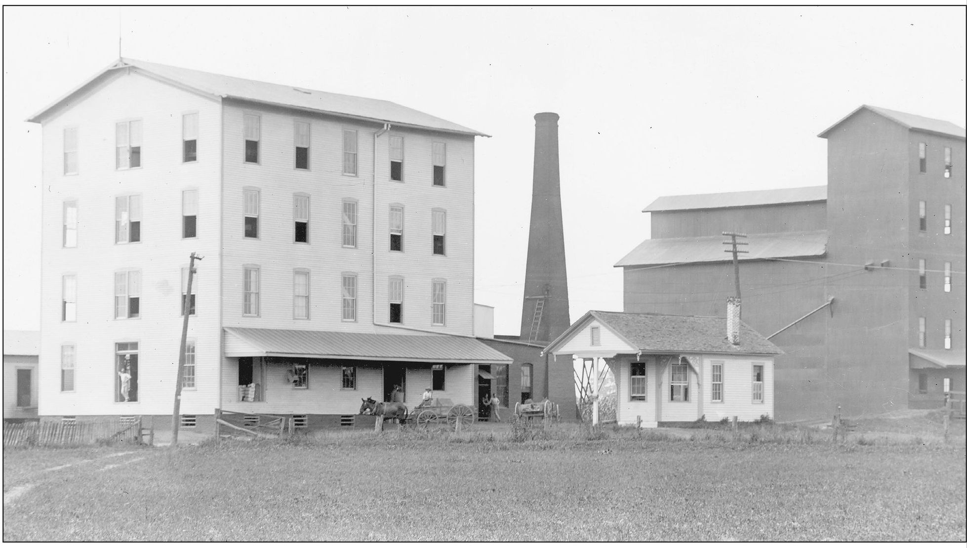 This July 19 1906 photograph shows the Corbin Milling Company on New Harmonys - photo 8