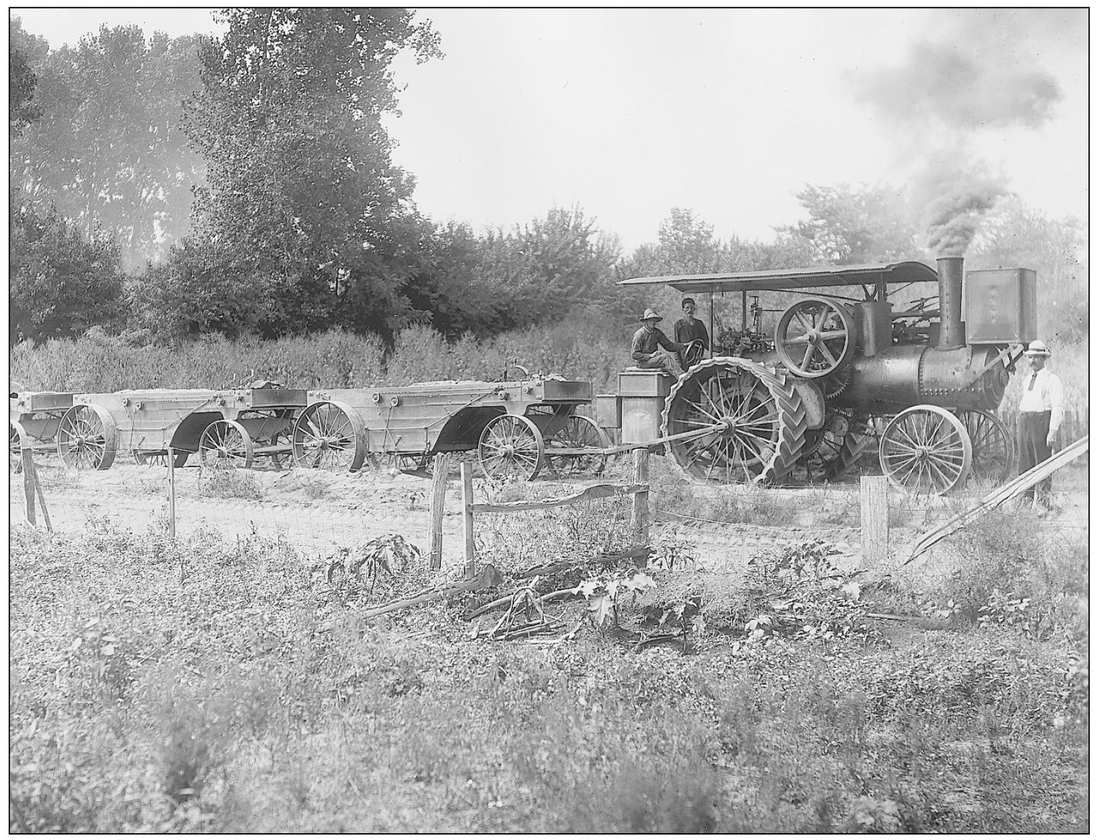 Here a steam traction engine is being used to help build the new country roads - photo 11