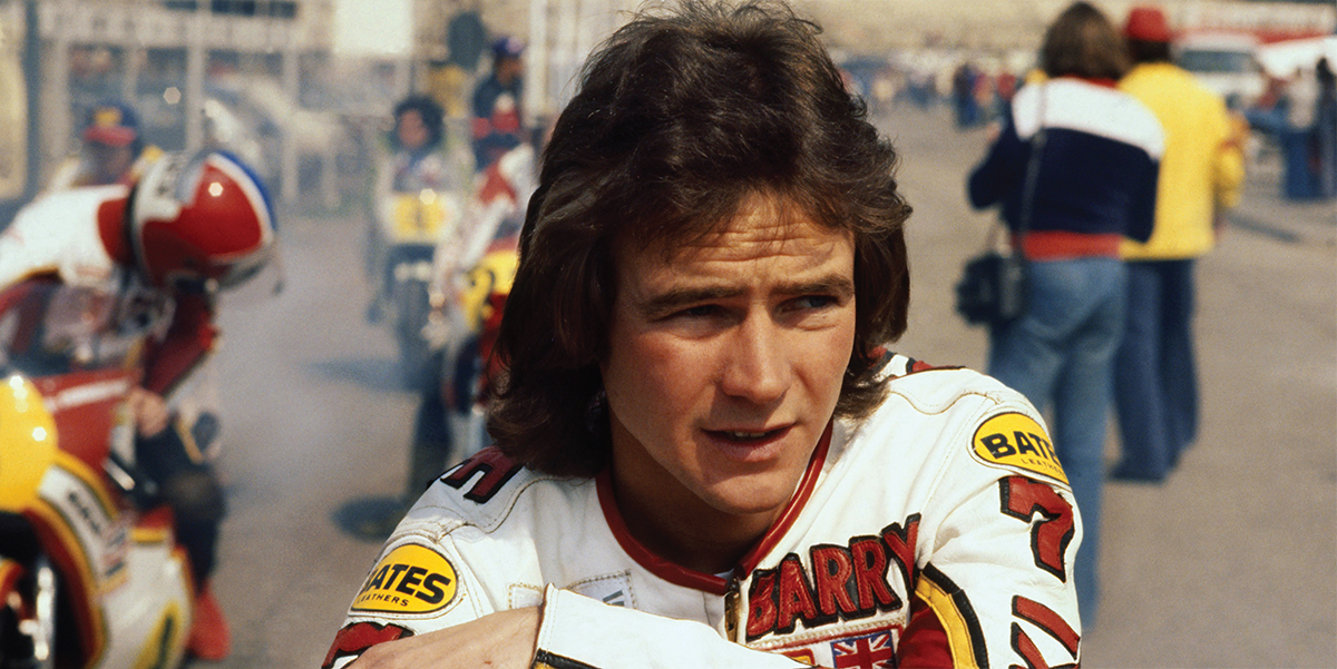 A slightly pensive looking Barry sits astride his Suzuki in the pits at - photo 6