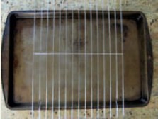 Drain the water from the tofu package Place the baking pan on flat surface a - photo 2