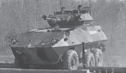 A Canadian Cougar based on the six-wheeled version of the Swiss MOWAG Piranha - photo 3