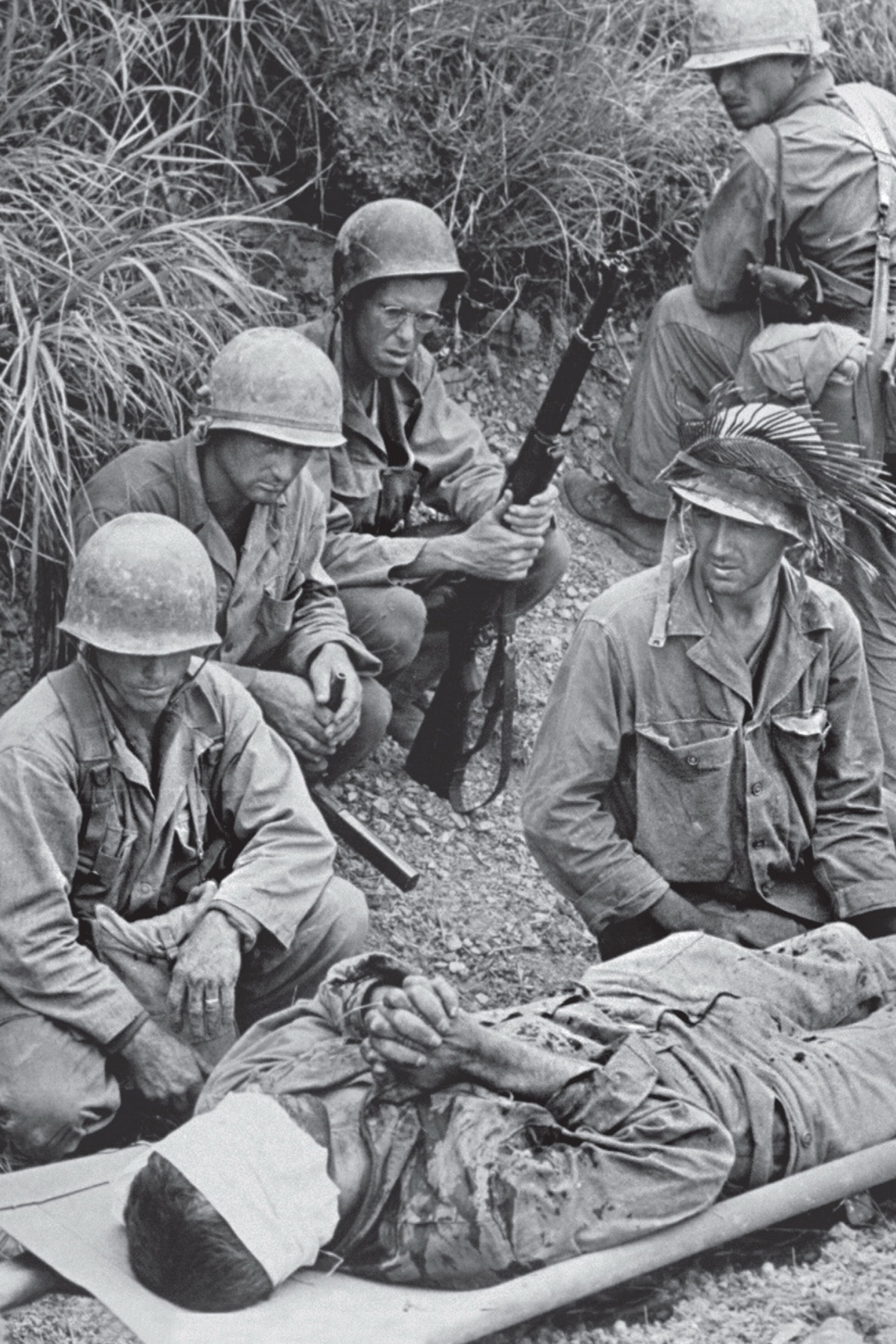 A wounded GI awaits evacuation on Okinawa where nearly 50000 US soldiers - photo 6