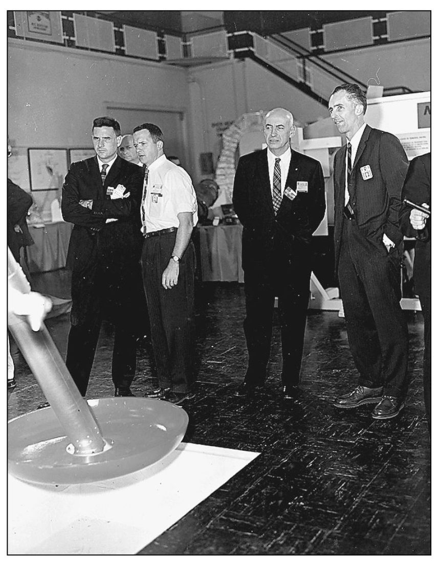 TOM KELLY WITH NASA OFFICIALS 1964 Tom Kelly second from the left explains - photo 11