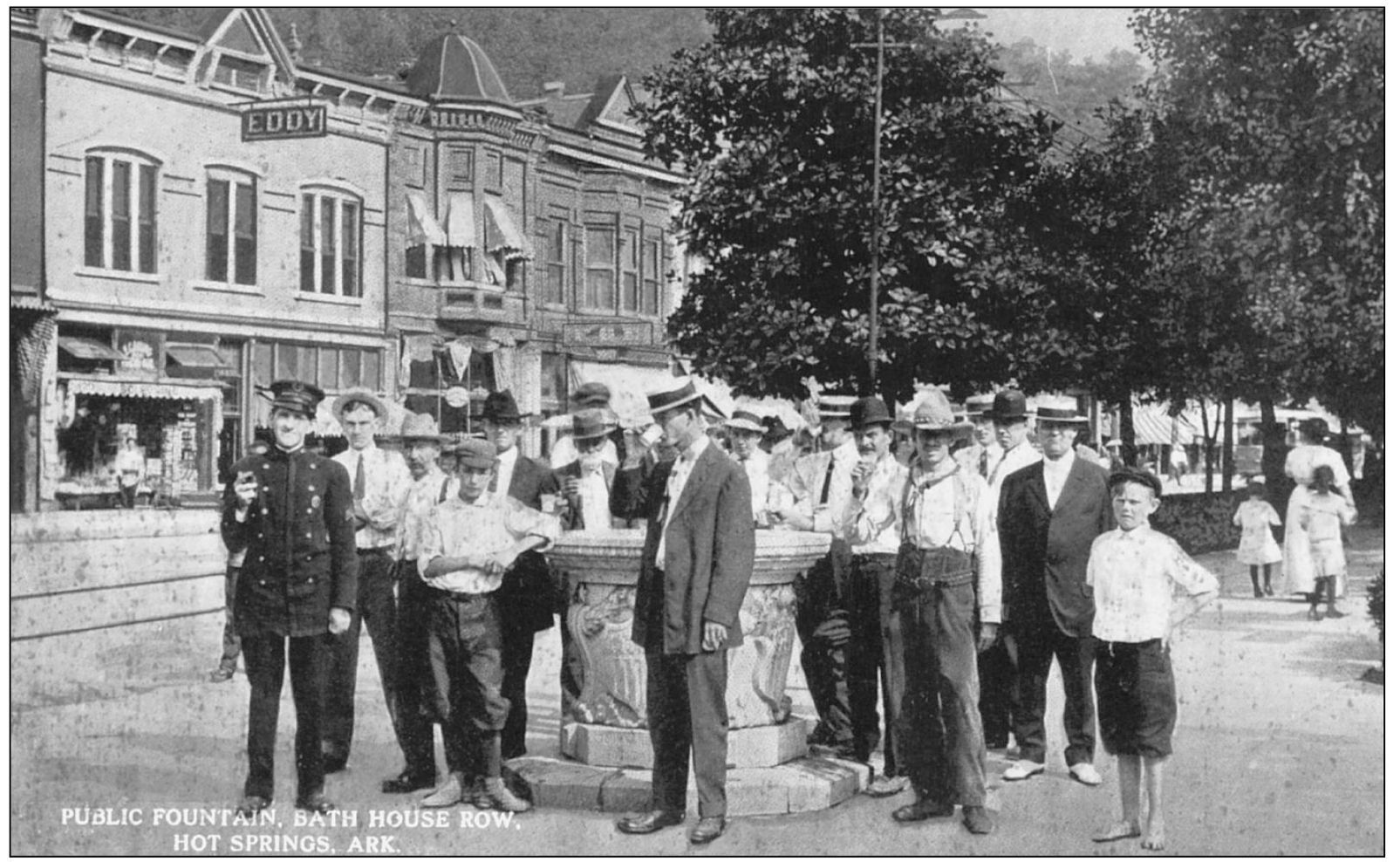 Among those holding up a cup of the fountains mineral water in this view are a - photo 10