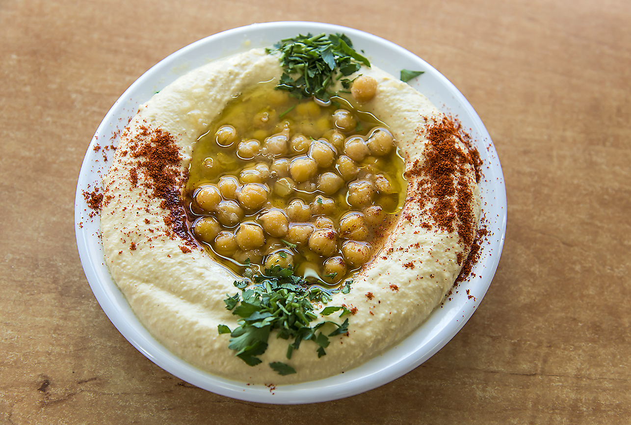 DANIEL REINERSHUTTERSTOCK Eating in Jerusalem The two tent poles of Middle - photo 17