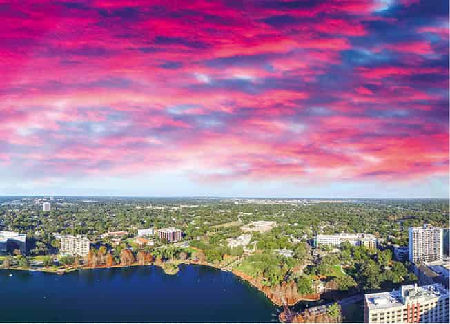 Downtown Orlando at sunset Shutterstock Lakes and rivers Orlandos landscape is - photo 12