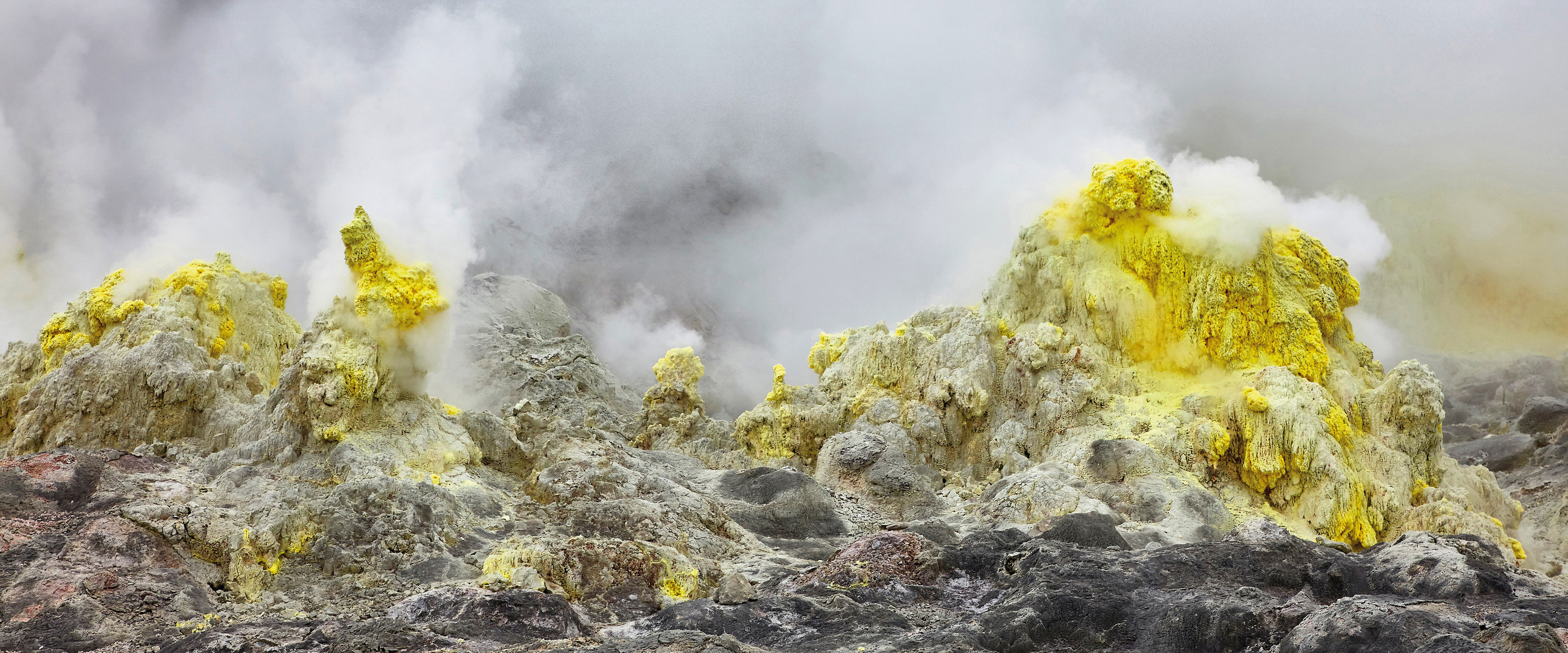 Akan National Park Yellow-stained sulphuric vents at I-zan volcano near Kawayu - photo 20