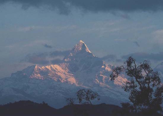 Machupuchhare Peak located in central Nepal north of Pokhara Valley is one of - photo 2