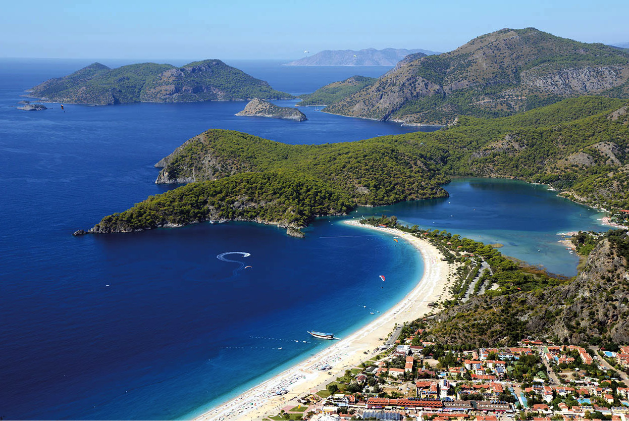 Top Attraction 8 iStock ldeniz Pine-clad hills and white-sand beaches back - photo 12